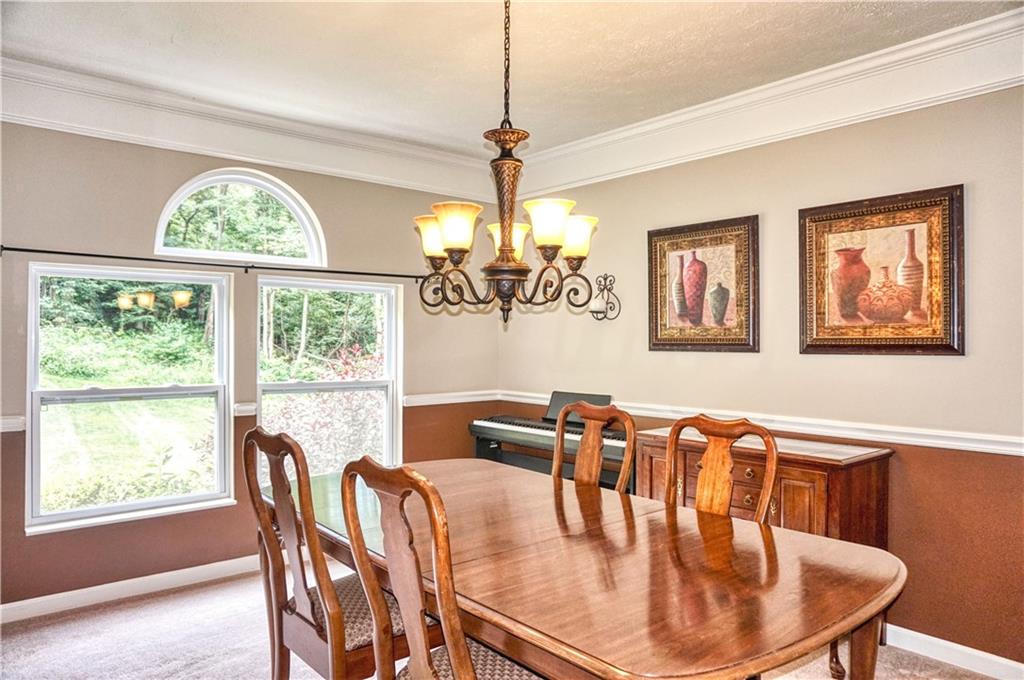 1123 Rural Ridge Drive Cheswick, PA 15024 - Photo 13 of 21 Formal dining room with crown molding and plenty of natural light!
