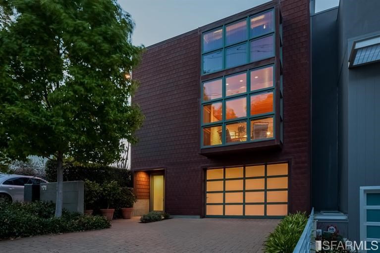 a front view of a house with a outdoor space