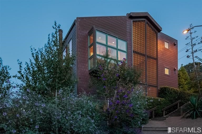 171 Ripley Street San Francisco, CA 94110 - Photo 2 of 10 a brick building with green walls