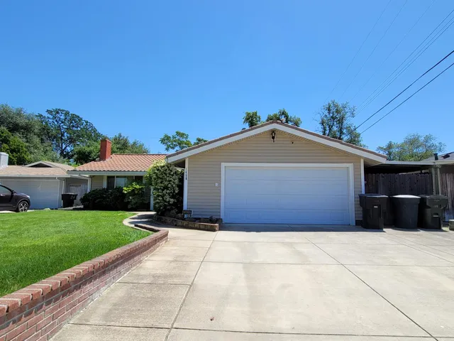 a view of house with outdoor space