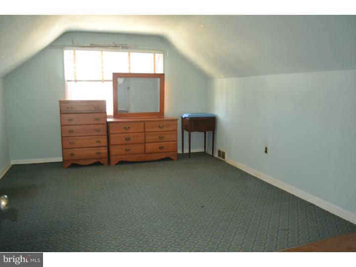 27 Golf Road Darby, PA 19023 - Photo 5 of 12 a room with furniture and window