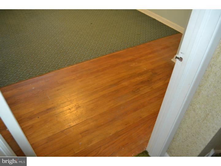 27 Golf Road Darby, PA 19023 - Photo 6 of 12 a view of a big room with wooden floor