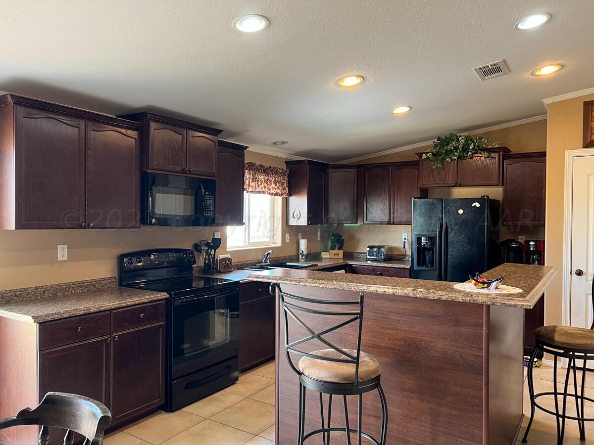 7670 West Cemetery Road Canyon, TX 79015 - Photo 23 of 65 7670_W_Cemetery-047_Main_House_Kitchen