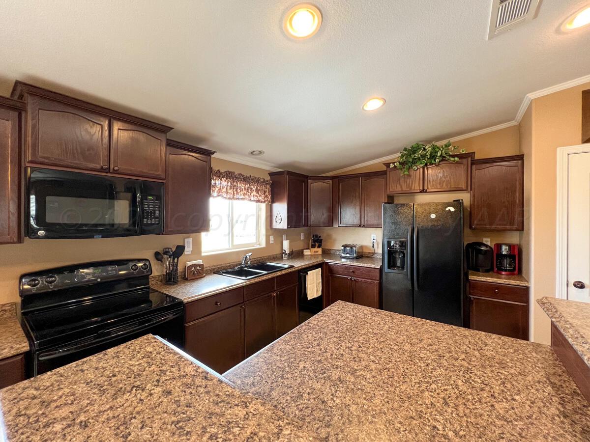 7670 West Cemetery Road Canyon, TX 79015 - Photo 24 of 65 7670_W_Cemetery-062_Main_House_Kitchen
