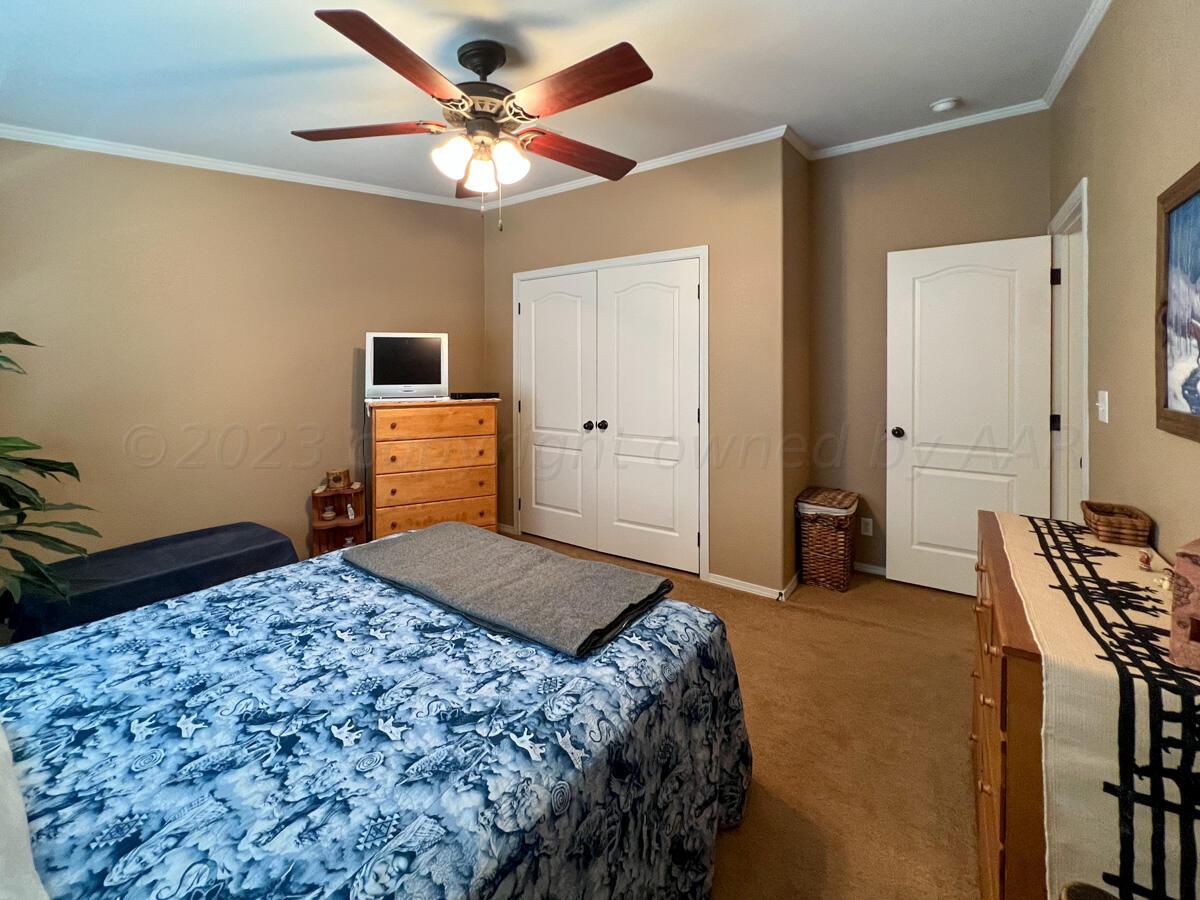 7670 West Cemetery Road Canyon, TX 79015 - Photo 30 of 65 7670_W_Cemetery-059_Main_House_Bedroom