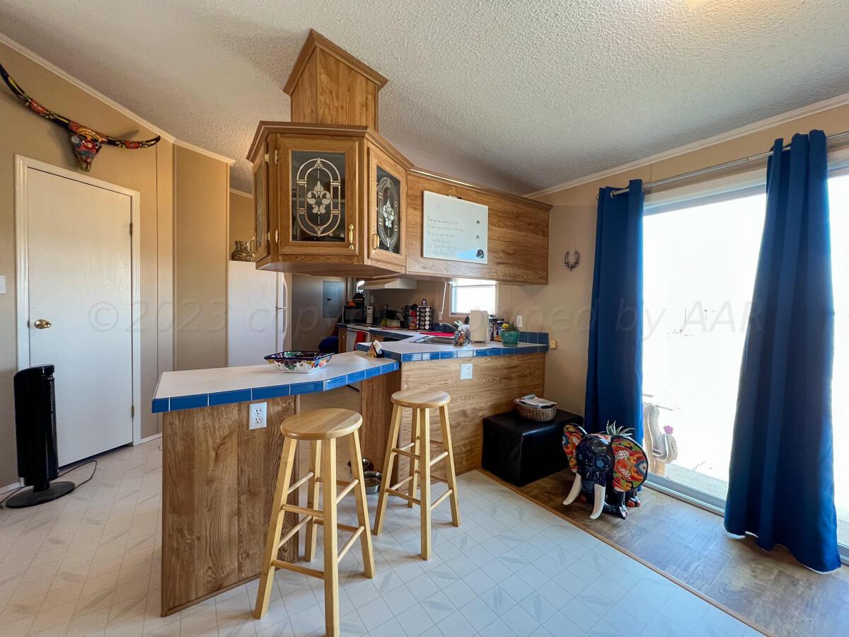 7670 West Cemetery Road Canyon, TX 79015 - Photo 38 of 65 7670_W_Cemetery-037_2nd_House_Kitchen