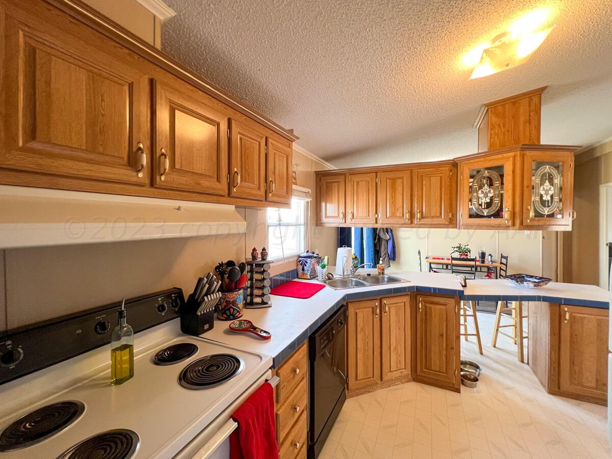 7670 West Cemetery Road Canyon, TX 79015 - Photo 40 of 65 7670_W_Cemetery-036_2nd_House_Kitchen