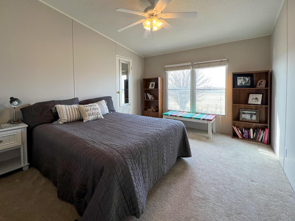 7670 West Cemetery Road Canyon, TX 79015 - Photo 41 of 65 7670_W_Cemetery-032_2nd_House_Bedroom