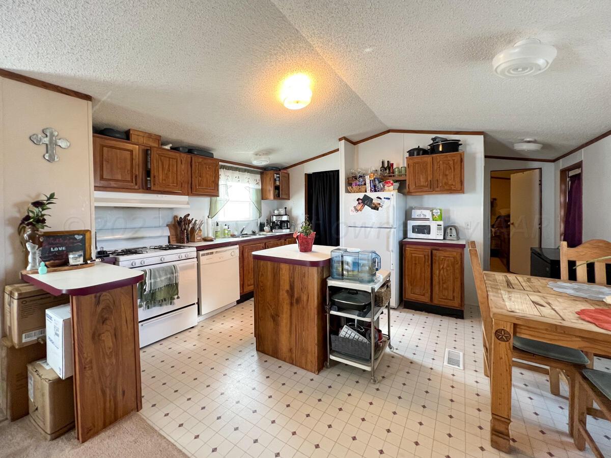 7670 West Cemetery Road Canyon, TX 79015 - Photo 51 of 65 7670_W_Cemetery-041_3rd_House_Kitchen