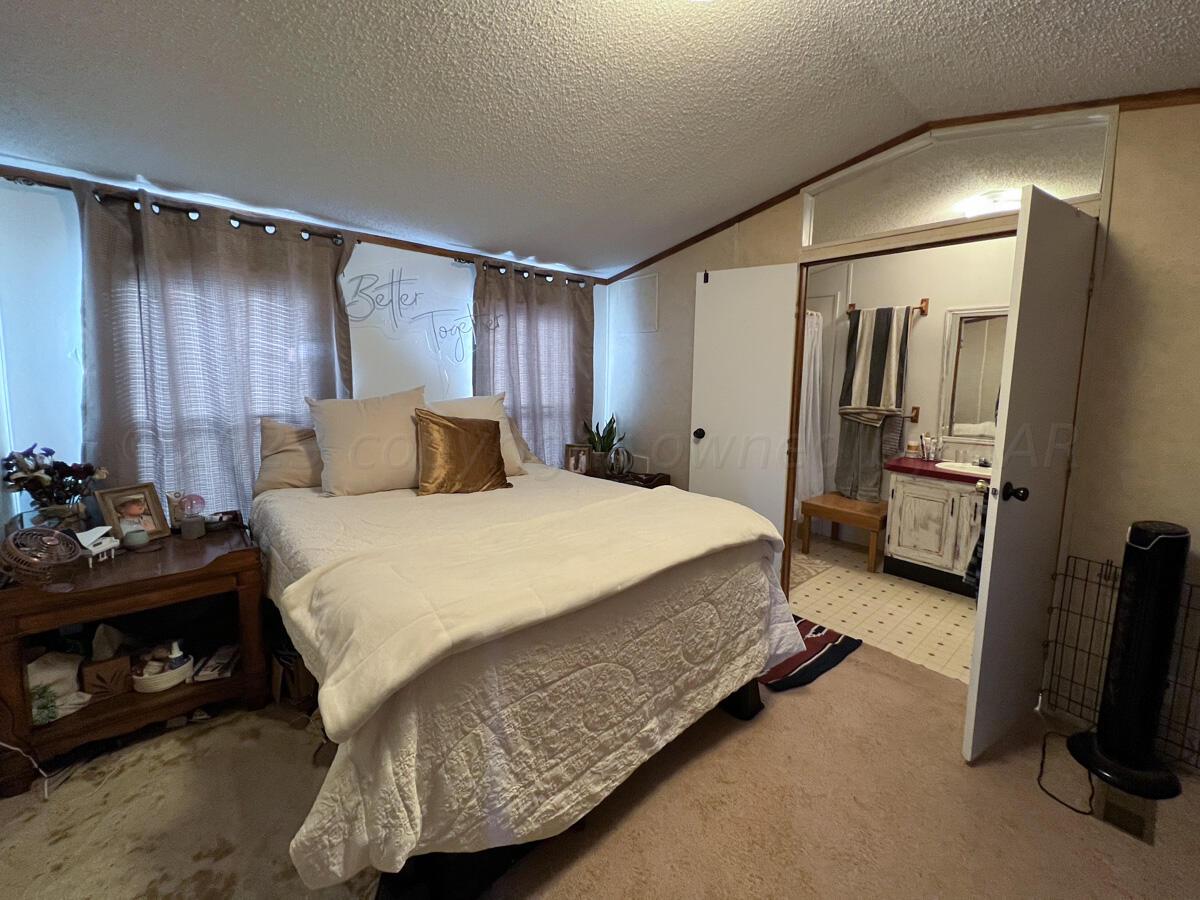7670 West Cemetery Road Canyon, TX 79015 - Photo 52 of 65 7670_W_Cemetery-043_3rd_House_Master_Bed