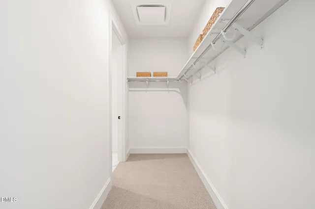 a view of a room with a table and chair