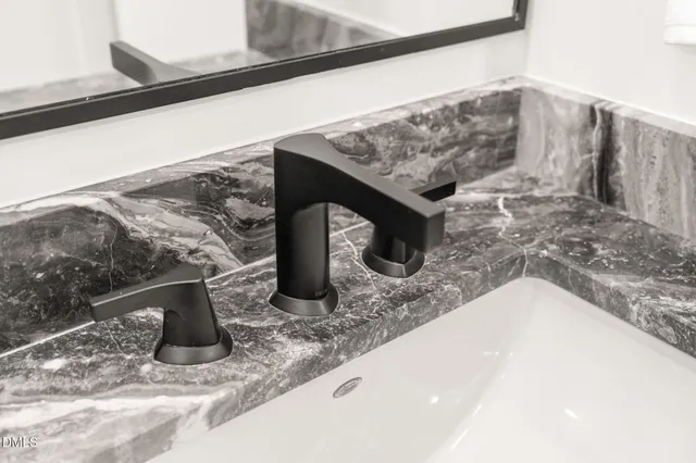 a bathroom with a shower and a bath tub