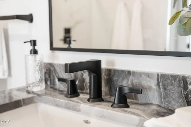 a view of a swimming pool and a patio