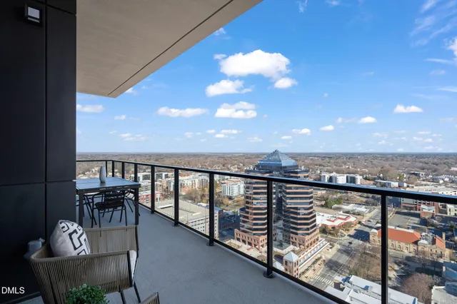 a view of a city with tall buildings