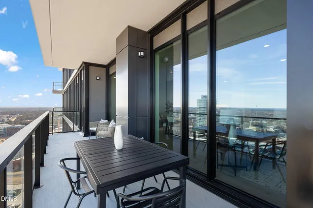 a view of buildings from balcony