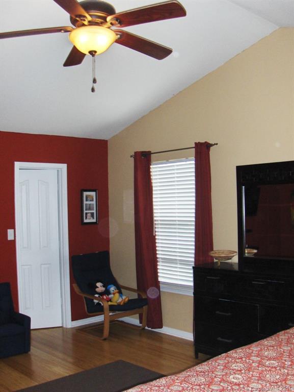 921 River Trail Road Lowell, NC 28098 - Photo 15 of 23 a room with furniture and wooden floor