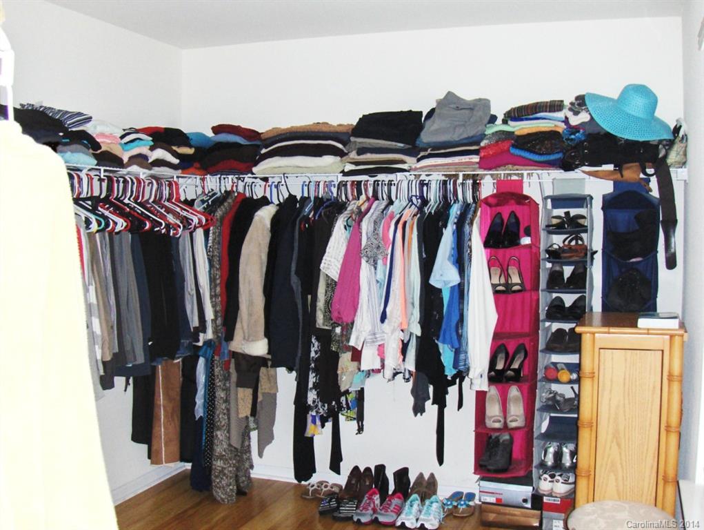 921 River Trail Road Lowell, NC 28098 - Photo 16 of 23 a view of walk in closet with clothes and shoes