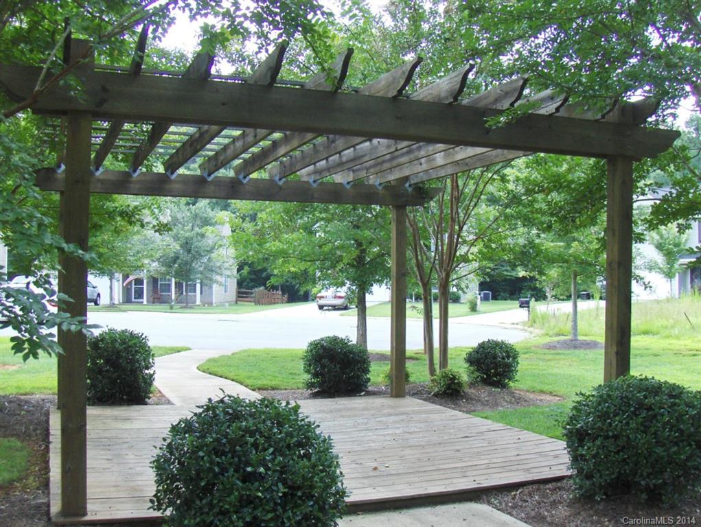 921 River Trail Road Lowell, NC 28098 - Photo 20 of 23 a view of a backyard with a garden