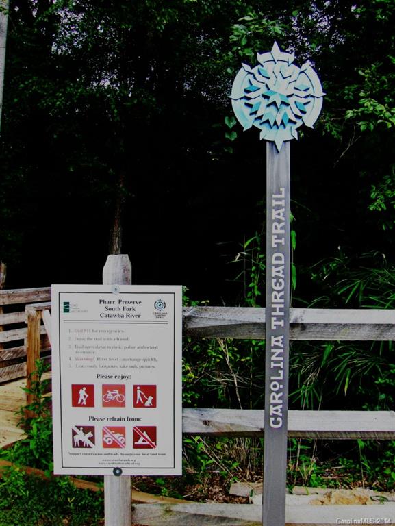 921 River Trail Road Lowell, NC 28098 - Photo 23 of 23 a sign on the side of a road