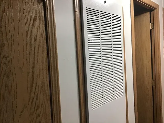 a view of a bedroom from a hallway