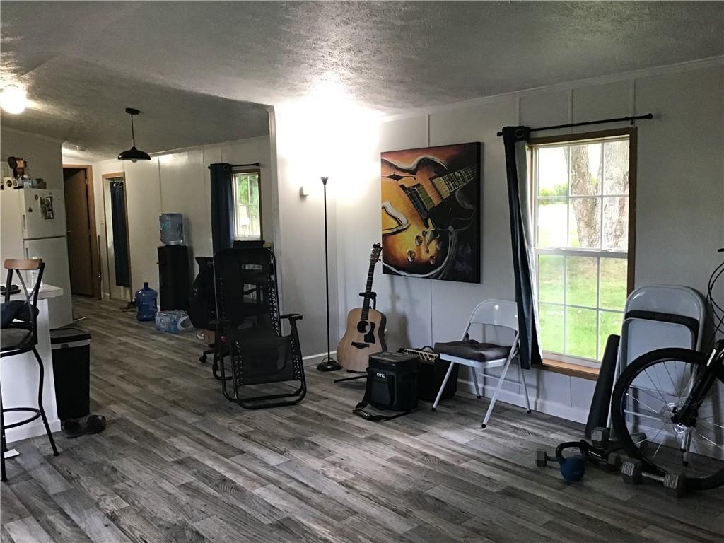 4053 Pioneer Lake Road Cherry Tree, PA 15724 - Photo 10 of 30 a room with gym equipment and a window