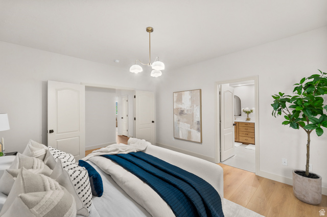 340 Brayden Way Draper, UT 84020 - Photo 18 of 58 Recessed lighting, wood-finish flooring, white walls, white trim, and a brass-finish ceiling light fixture