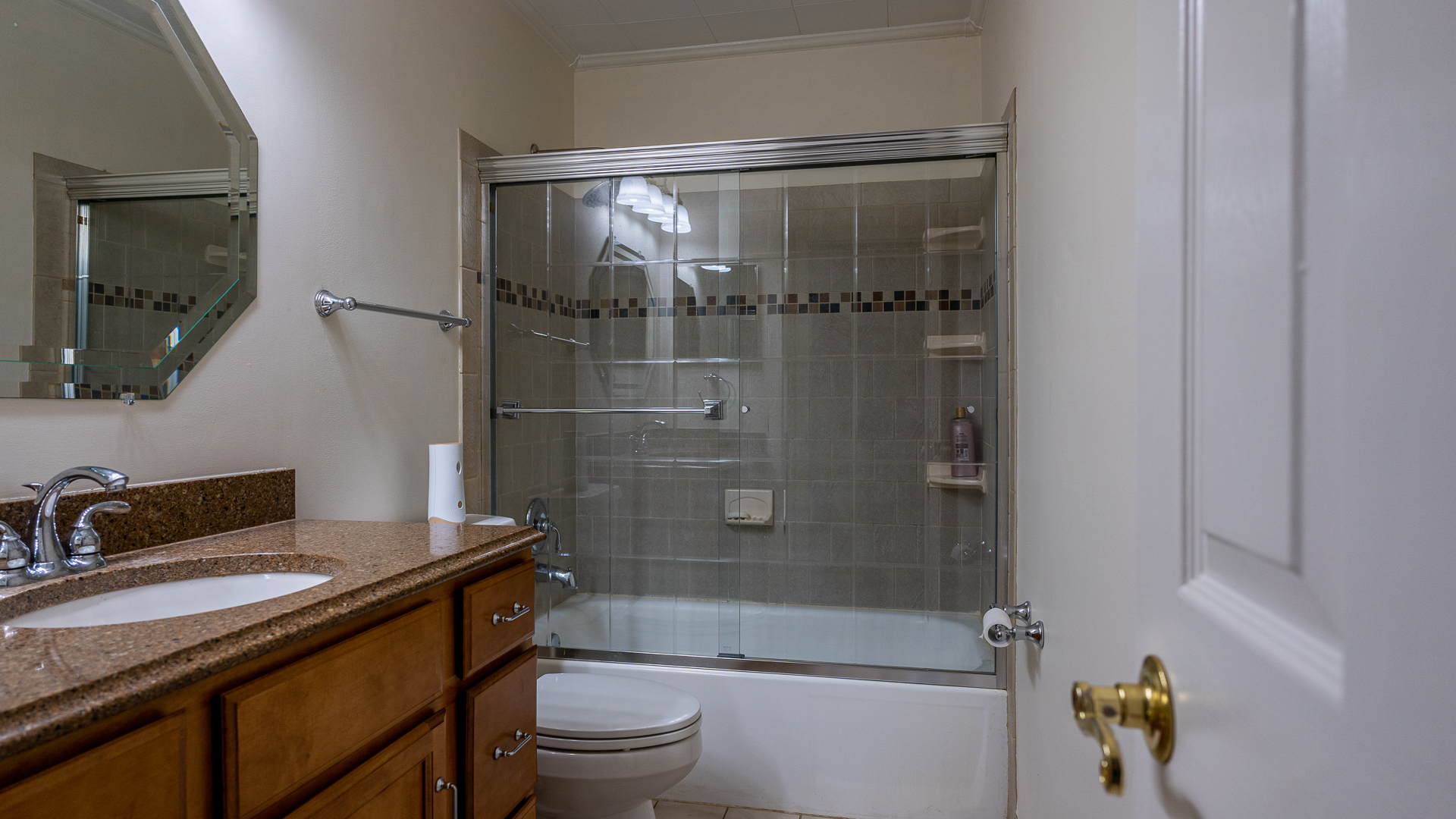 829 Prairie Avenue Bartlett, IL 60103 - Photo 13 of 25 a bathroom with a sink toilet and shower