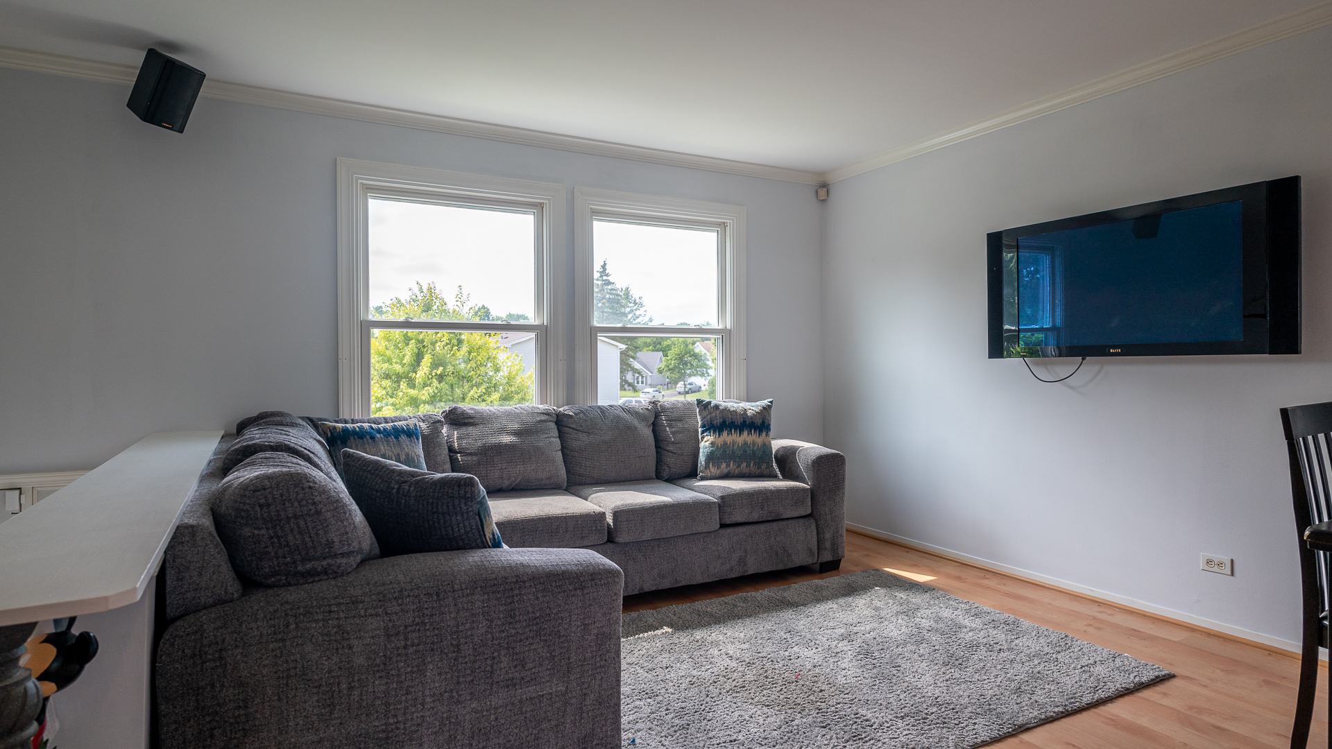 829 Prairie Avenue Bartlett, IL 60103 - Photo 21 of 25 a living room with furniture and a flat screen tv