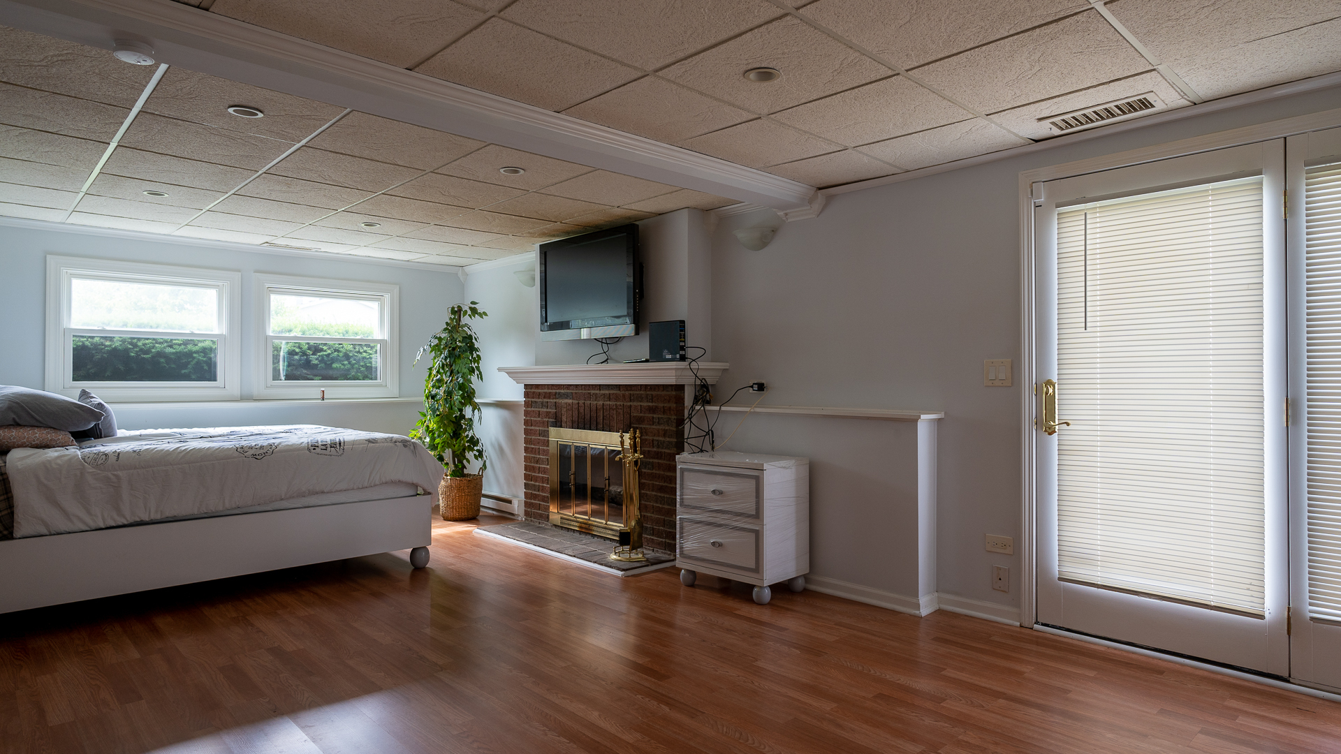 829 Prairie Avenue Bartlett, IL 60103 - Photo 23 of 25 a living room with furniture and a fireplace