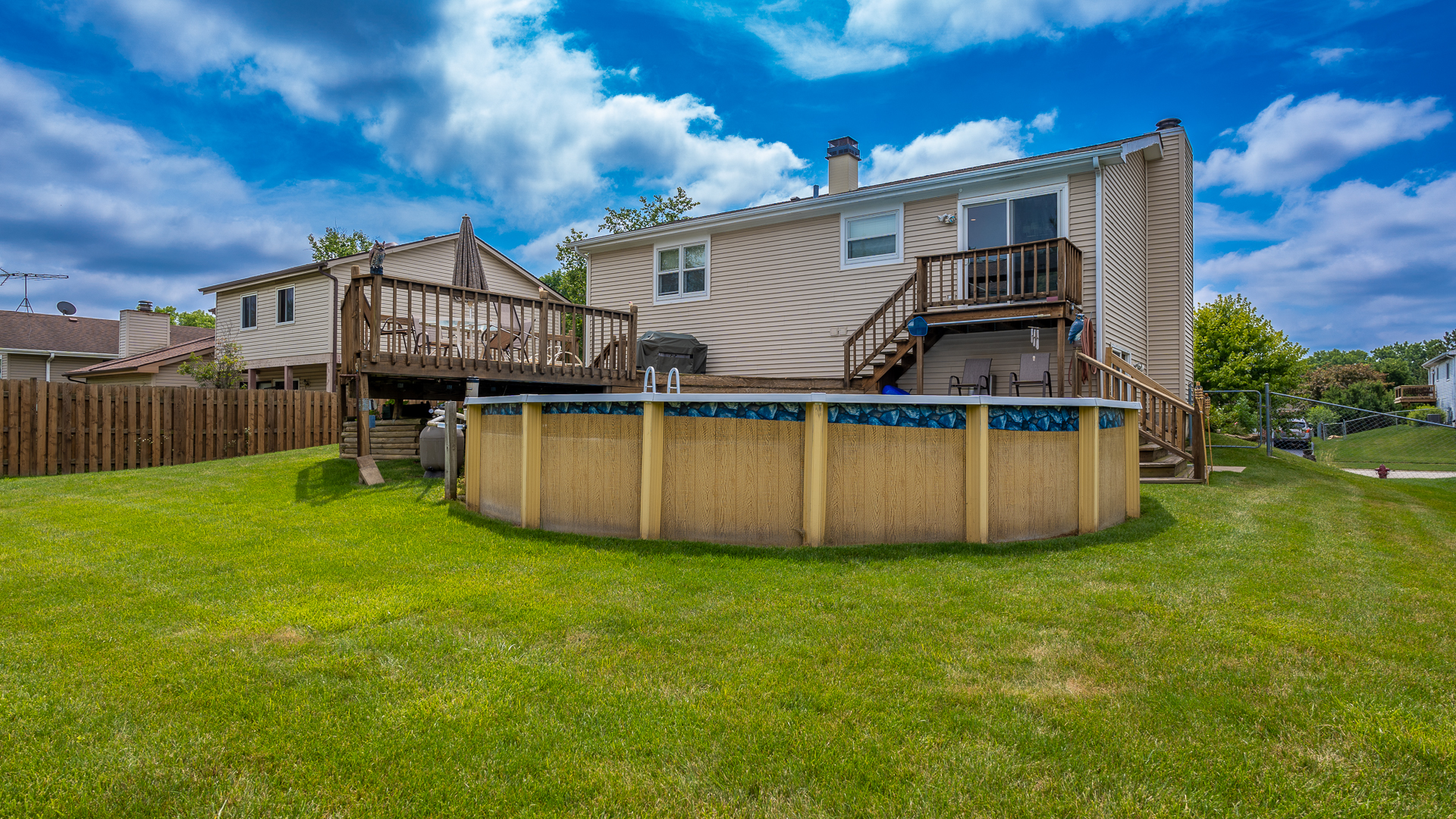 829 Prairie Avenue Bartlett, IL 60103 - Photo 7 of 25 a view of a house with pool and chairs