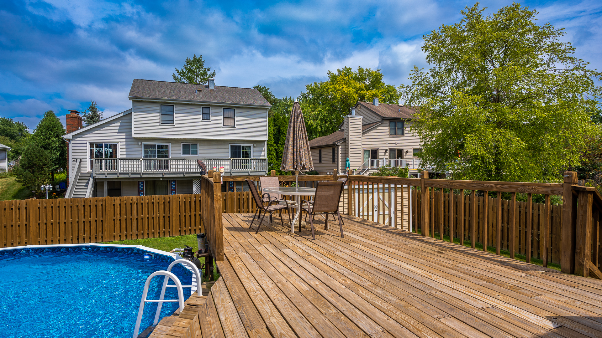 829 Prairie Avenue Bartlett, IL 60103 - Photo 8 of 25 a view of a house with wooden deck