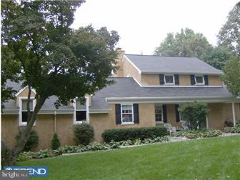 157 Ridgefield Road Newtown Square, PA 19073 - Photo 2 of 12 front view of a house with a yard