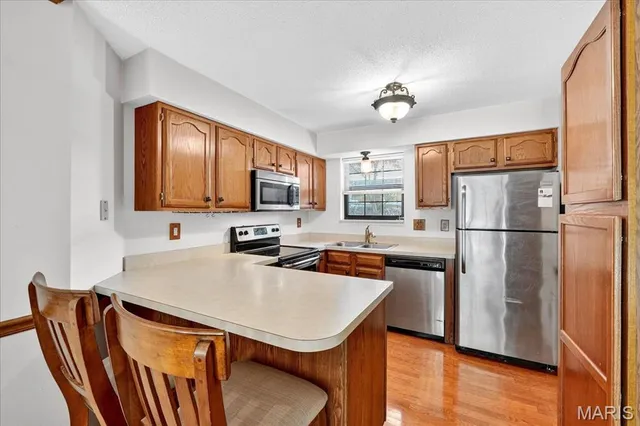 $157,000 | 12952 Bryce Canyon Drive, Unit B, Maryland Heights, MO 63043