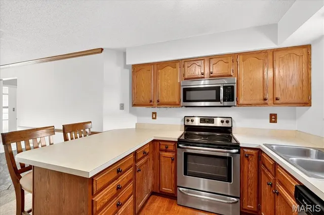 $157,000 | 12952 Bryce Canyon Drive, Unit B, Maryland Heights, MO 63043