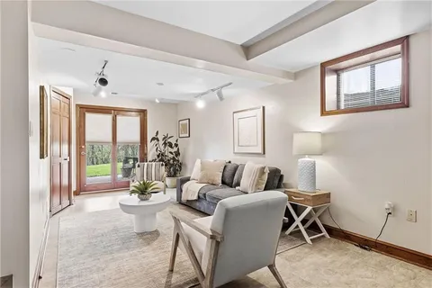 a view of a chairs and table in a patio