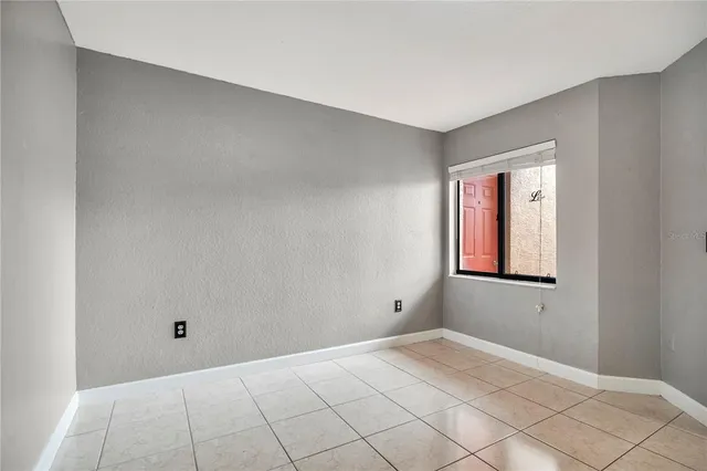 a view of an empty room with window