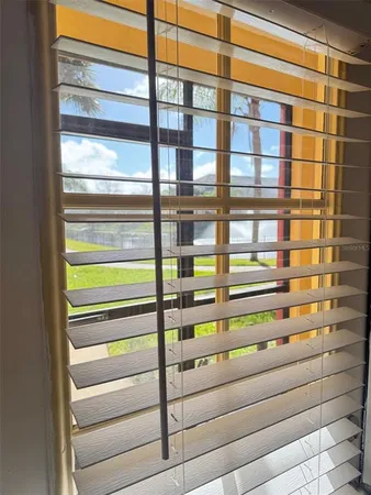 a view of a park with swings and slides