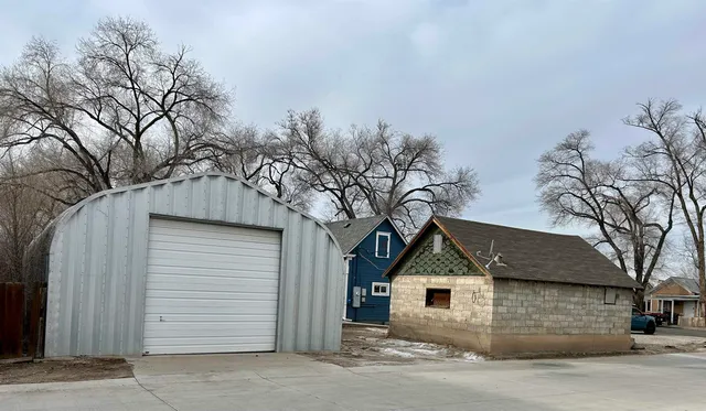 a front view of a house with a garage