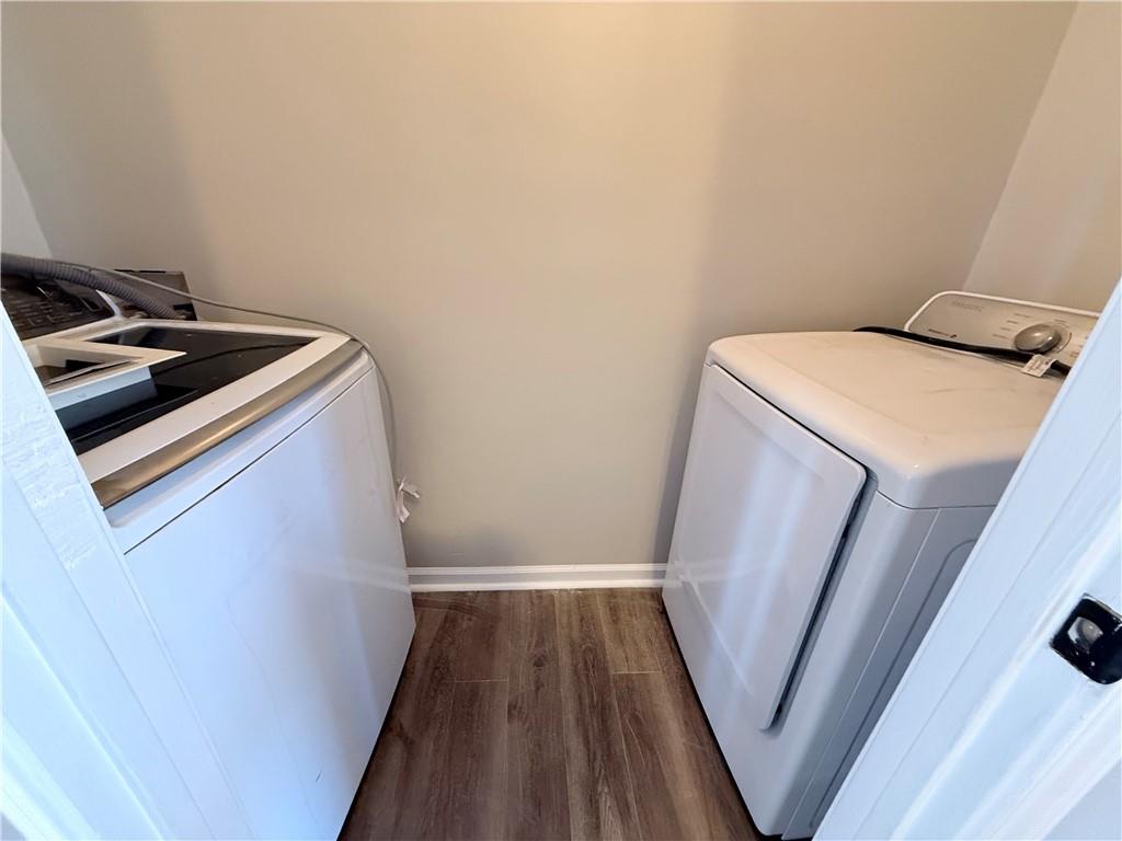 2000 Sage Court Loganville, GA 30052 - Photo 20 of 77 a utility room with sink dryer and washer