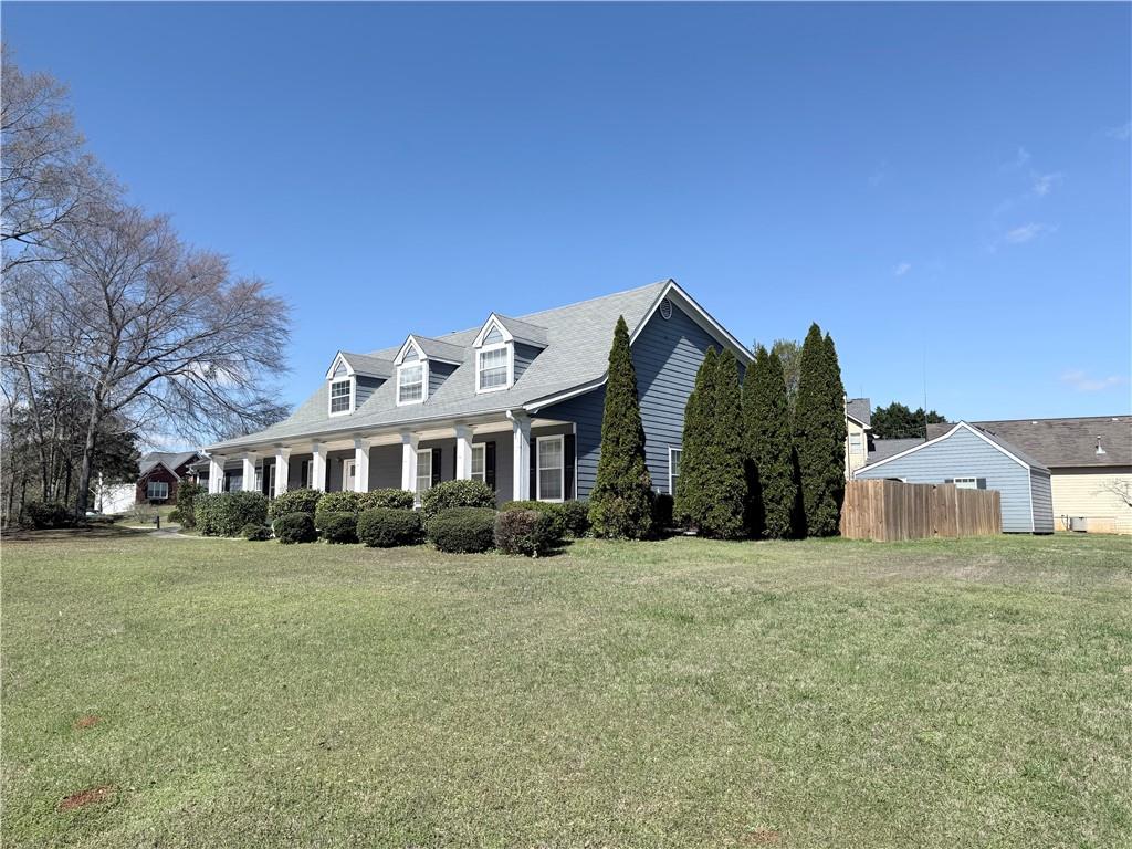 2000 Sage Court Loganville, GA 30052 - Photo 2 of 77 a front view of a house with a yard