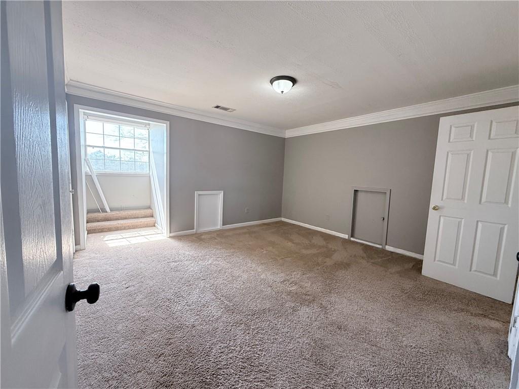 2000 Sage Court Loganville, GA 30052 - Photo 33 of 77 a view of an empty room with a window