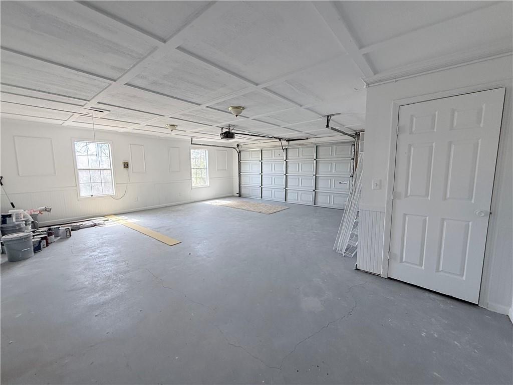 2000 Sage Court Loganville, GA 30052 - Photo 47 of 77 an empty room with a empty space and windows