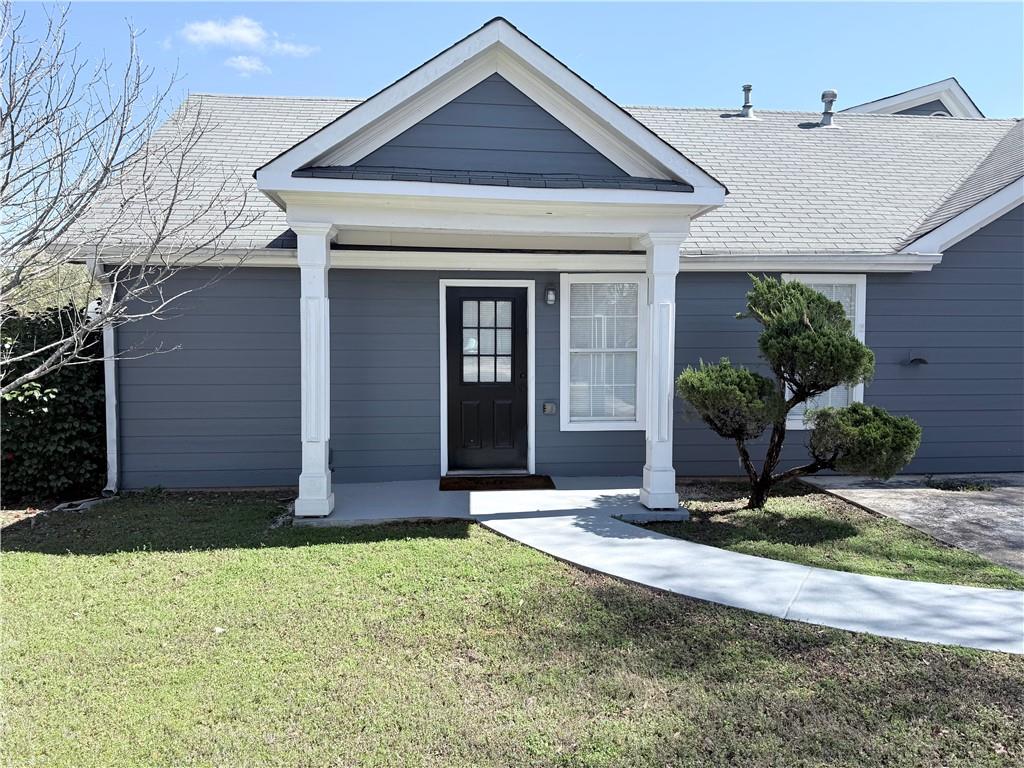 2000 Sage Court Loganville, GA 30052 - Photo 48 of 77 a view of a house with small yard plants and wooden fence