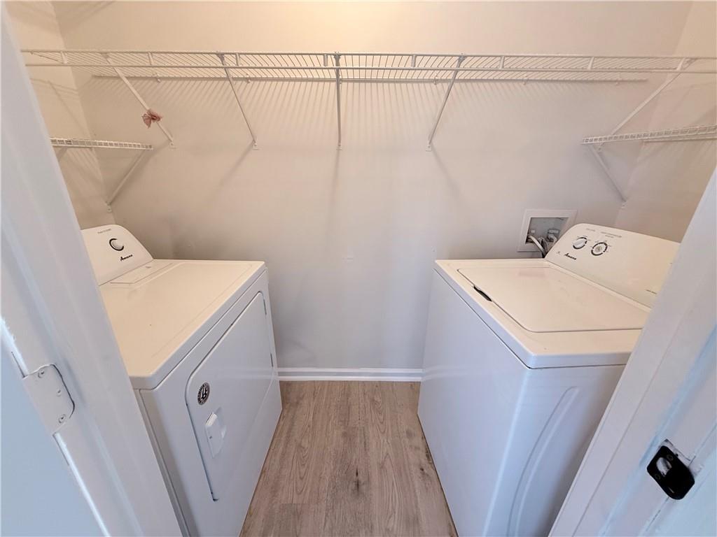 2000 Sage Court Loganville, GA 30052 - Photo 59 of 77 a utility room with dryer and washer