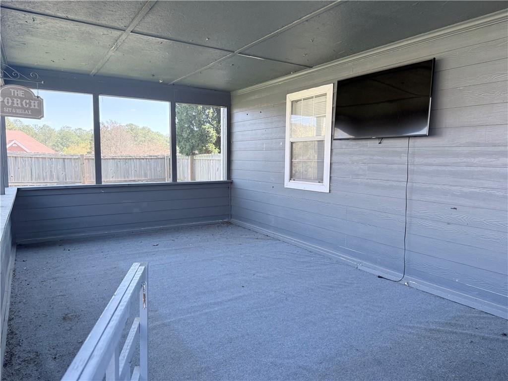 2000 Sage Court Loganville, GA 30052 - Photo 64 of 77 a view of room with window and a flat screen tv