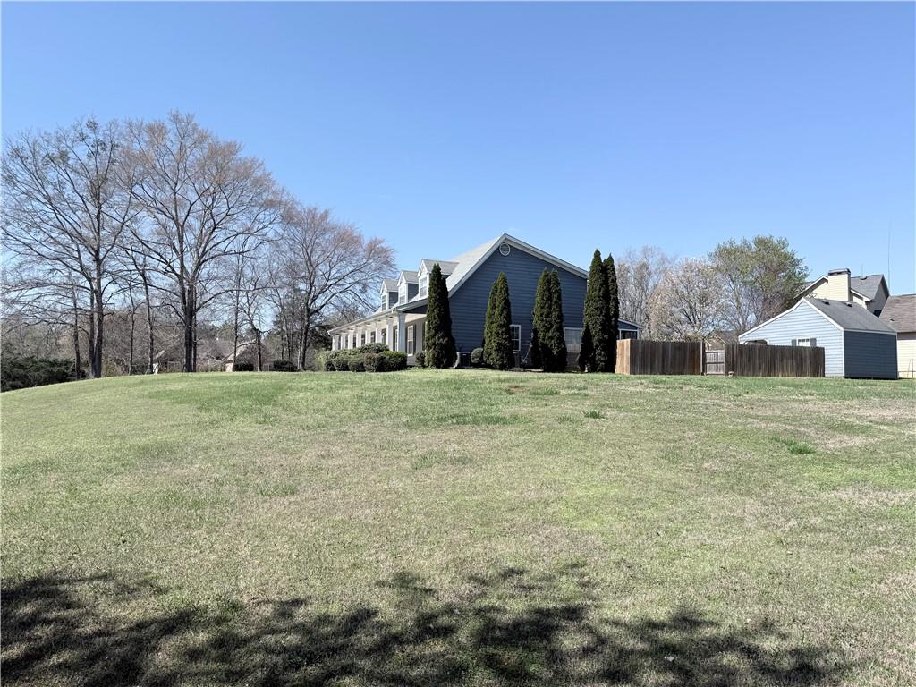 2000 Sage Court Loganville, GA 30052 - Photo 74 of 77 a view of large yard with large trees