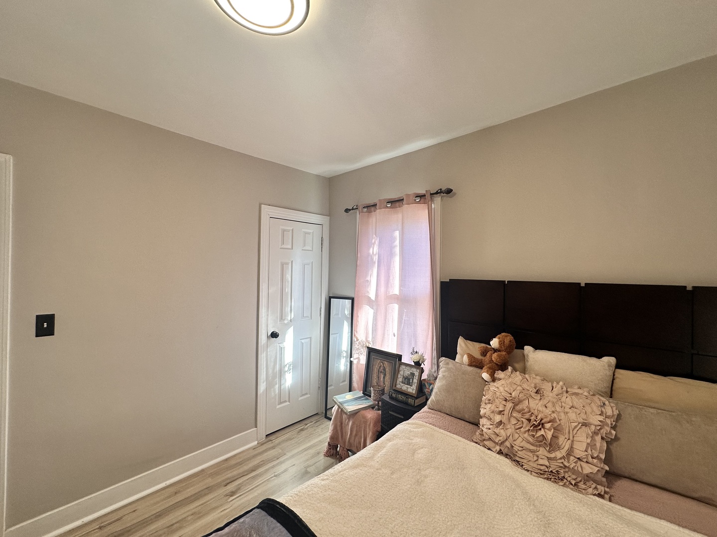 131 North Kendall Street Aurora, IL 60505 - Photo 13 of 29 a bed room with a bed and a window