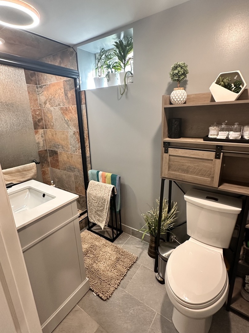 131 North Kendall Street Aurora, IL 60505 - Photo 19 of 29 a bathroom with a toilet and a sink