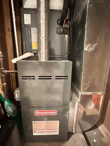 a view of a patio with table and chairs with wooden fence