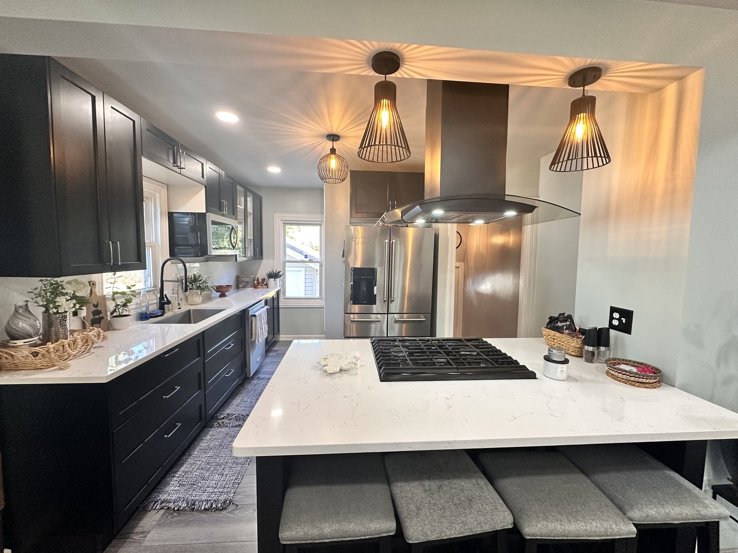 131 North Kendall Street Aurora, IL 60505 - Photo 6 of 29 a large kitchen with a table chairs and a wooden floor